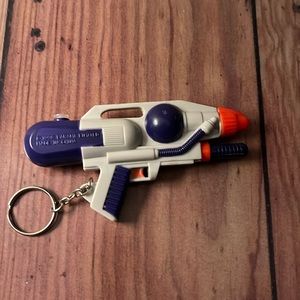 Vintage Soaker Water KeyChain 1998